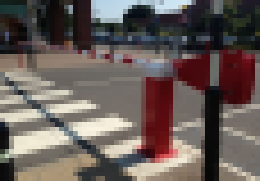 Image of D1500 Manual Car Parking Barriers across pedestrian crossing by Dock Solutions